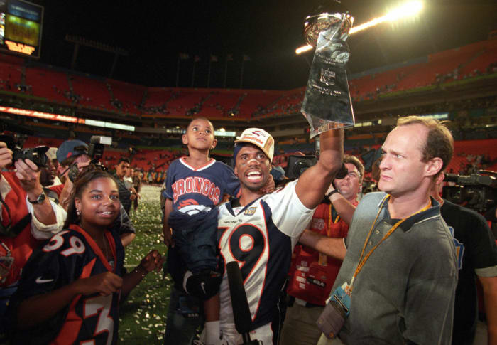 Denver Broncos cornerback Ray Crockett (39) celebrates on the field after defeating the Atlanta Falcons during Super Bowl XXXIII at Dolphin Stadium. The Broncos defeated the Falcons 34-19.